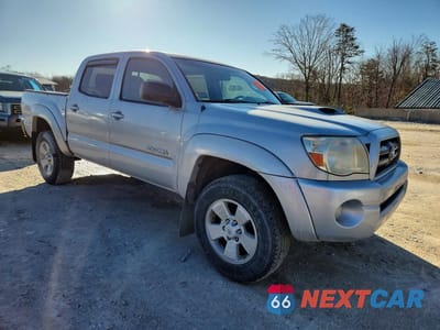 Czwarte zdjęcie samochodu z boku: 2009 TOYOTA TACOMA V6 VIN:3TMLU42N09M034709 - miniatura