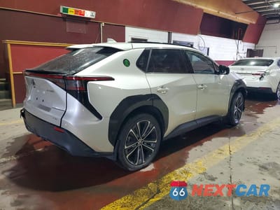 Trzecie zdjęcie samochodu z tyłu: 2023 TOYOTA BZ4X LIMITED VIN:JTMABACA4PA039025 - miniatura