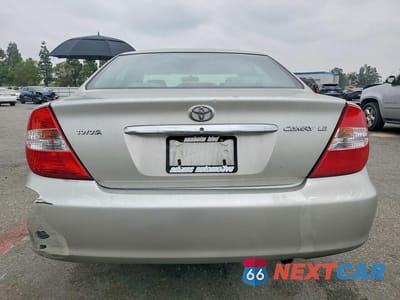 Zdjęcie 6 z 11 samochodu: 2002 TOYOTA CAMRY LE VIN:JTDBE32K420105377 - miniatura