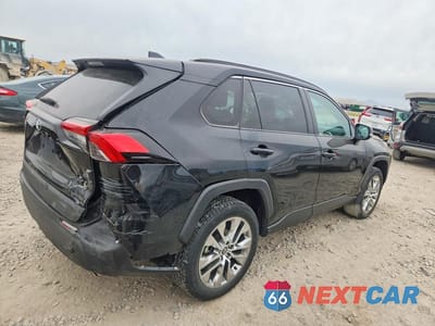 Trzecie zdjęcie samochodu z tyłu: 2021 TOYOTA RAV4 XLE PREMIUM VIN:2T3A1RFV0MC201084 - miniatura