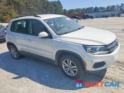 Czwarte zdjęcie samochodu z boku: 2017 VOLKSWAGEN TIGUAN S VIN:WVGAV7AX7HK017674 - miniatura