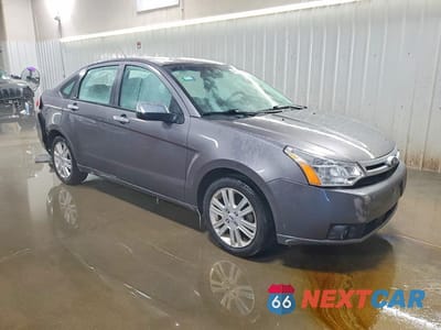 Czwarte zdjęcie samochodu z boku: 2010 FORD FOCUS SEL VIN:1FAHP3HN7AW261436 - miniatura