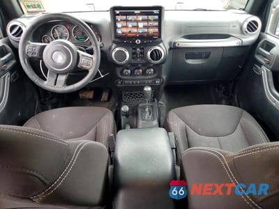 Zdjęcie 8 z 13 samochodu: 2015 JEEP WRANGLER UNLIMITED SAHARA VIN:1C4HJWEG6FL524883 - miniatura