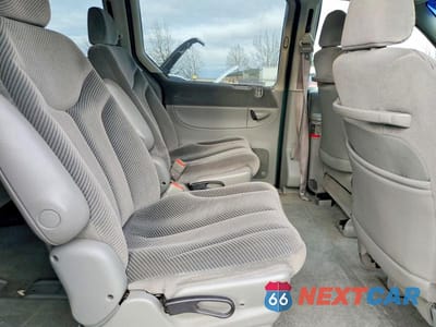 Zdjęcie 11 z 13 samochodu: 1996 DODGE GRAND CARAVAN LE VIN:1B4GP54L7TB109444 - miniatura