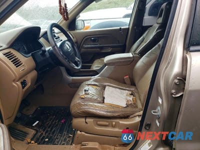 Zdjęcie 7 z 13 samochodu: 2004 HONDA PILOT EXL VIN:2HKYF18504H508548 - miniatura