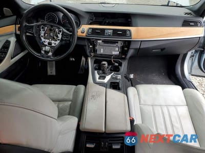 Zdjęcie 8 z 12 samochodu: 2016 BMW M5 VIN:WBSFV9C58GG343480 - miniatura