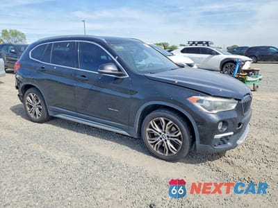 Czwarte zdjęcie samochodu z boku: 2016 BMW X1 XDRIVE28I VIN:WBXHT3Z35G4A50331 - miniatura