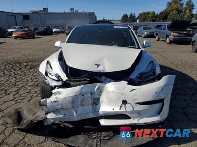 Piąte zdjęcie samochodu w środku: 2019 TESLA MODEL 3 VIN:5YJ3E1EA8KF484901 - miniatura