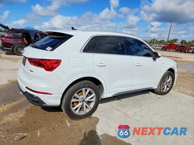 Trzecie zdjęcie samochodu z tyłu: 2021 AUDI Q3 VIN:WA1DECF39M1046202 - miniatura