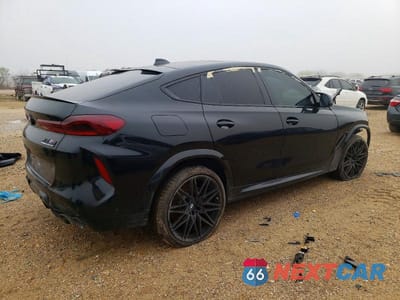 Trzecie zdjęcie samochodu z tyłu: 2021 BMW X6 M VIN:5YMCY0C09M9E09840 - miniatura