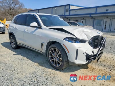 Czwarte zdjęcie samochodu z boku: 2026 BMW X5 XDRIVE40I VIN:5UX23EU00T9182109 - miniatura