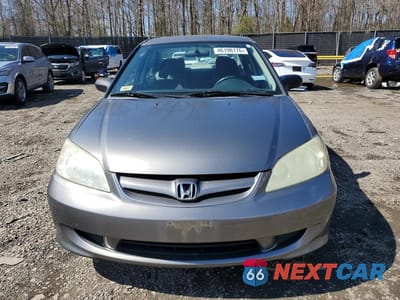 Piąte zdjęcie samochodu w środku: 2005 HONDA CIVIC DX VP VIN:1HGES16315L017887 - miniatura