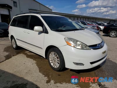 Czwarte zdjęcie samochodu z boku: 2010 TOYOTA SIENNA XLE LIMITED VIN:5TDYK4CC9AS312388 - miniatura