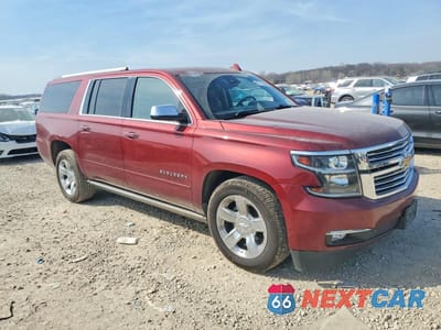 Czwarte zdjęcie samochodu z boku: 2016 CHEVROLET SUBURBAN K1500 LTZ VIN:1GNSKJKC1GR422646 - miniatura