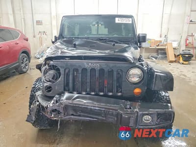 Piąte zdjęcie samochodu w środku: 2013 JEEP WRANGLER UNLIMITED SAHARA VIN:1C4BJWEG8DL509580 - miniatura