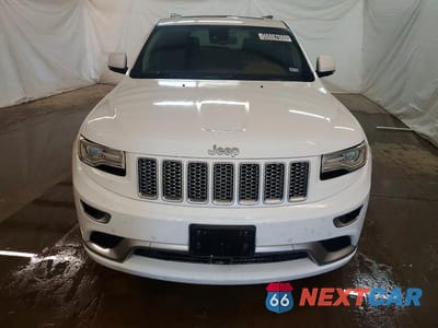 Piąte zdjęcie samochodu w środku: 2015 JEEP GRAND CHEROKEE SUMMIT VIN:1C4RJEJG9FC749884 - miniatura