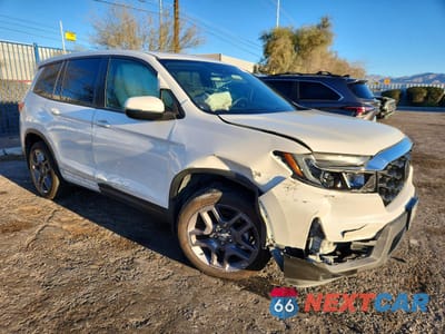 Czwarte zdjęcie samochodu z boku: 2022 HONDA PASSPORT EXL VIN:5FNYF7H50NB005542 - miniatura