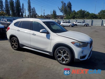 Czwarte zdjęcie samochodu z boku: 2018 BMW X1 SDRIVE28I XLINE VIN:WBXHU7C3XJ3F04390 - miniatura