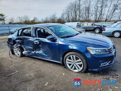 Czwarte zdjęcie samochodu z boku: 2018 VOLKSWAGEN PASSAT SE VIN:1VWBA7A3XJC027629 - miniatura