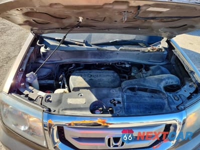 Zdjęcie 12 z 13 samochodu: 2010 HONDA PILOT EXL VIN:5FNYF4H54AB023714 - miniatura