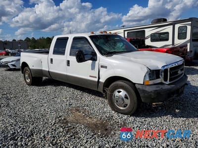 Czwarte zdjęcie samochodu z boku: 2004 FORD F350 SRW SUPER DUTY VIN:1FTSX31P54EC33950 - miniatura