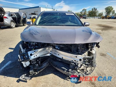 Piąte zdjęcie samochodu w środku: 2022 TOYOTA CAMRY HYBRID XSE VIN:4T1K31AK1NU574267 - miniatura