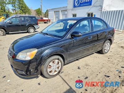 2010 KIA RIO BASE KNADH4A33A6651662 - główne zdjęcie licytacji z USA - miniatura