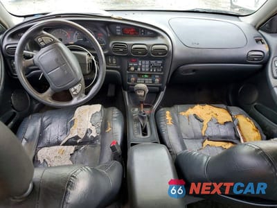 Zdjęcie 8 z 11 samochodu: 1997 PONTIAC GRAND PRIX GTP VIN:1G2WP5218VF291705 - miniatura