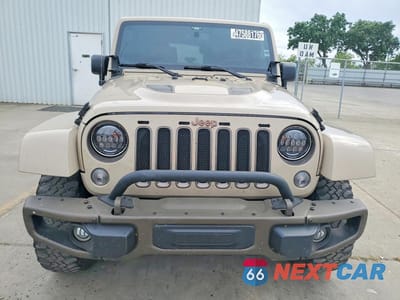 Piąte zdjęcie samochodu w środku: 2016 JEEP WRANGLER SAHARA VIN:1C4AJWBG9GL285594 - miniatura
