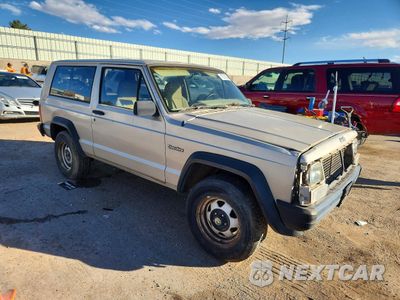 Czwarte zdjęcie samochodu z boku: 1996 JEEP CHEROKEE SE VIN:1J4FJ27S9TL123545 - miniatura