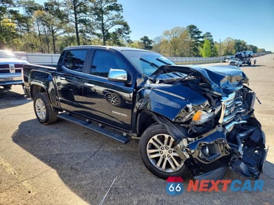 Czwarte zdjęcie samochodu z boku: 2016 GMC CANYON SLT VIN:1GTG5DE37G1356718 - miniatura