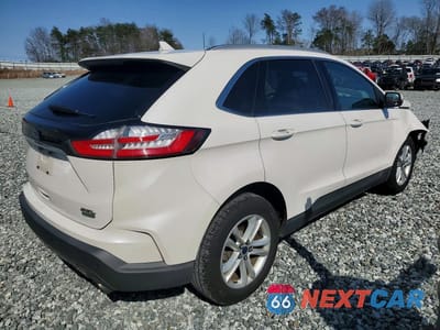 Trzecie zdjęcie samochodu z tyłu: 2019 FORD EDGE SEL VIN:2FMPK3J91KBC15147 - miniatura