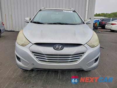 Piąte zdjęcie samochodu w środku: 2010 HYUNDAI TUCSON GLS VIN:KM8JU3AC4AU034435 - miniatura