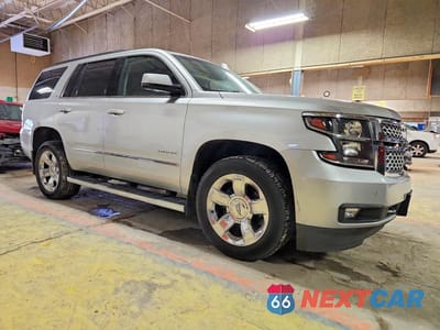 Czwarte zdjęcie samochodu z boku: 2017 CHEVROLET TAHOE K1500 LT VIN:1GNSKBKC4HR324895 - miniatura