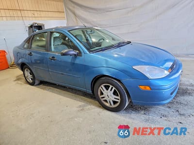 Czwarte zdjęcie samochodu z boku: 2000 FORD FOCUS SE VIN:1FAFP34P6YW205609 - miniatura