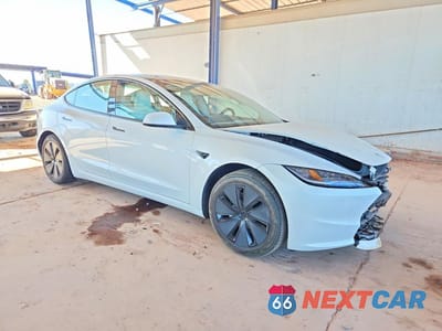 Czwarte zdjęcie samochodu z boku: 2024 TESLA MODEL 3 VIN:5YJ3E1EB5RF812519 - miniatura