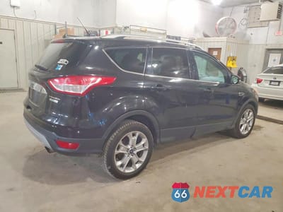 Trzecie zdjęcie samochodu z tyłu: 2014 FORD ESCAPE TITANIUM VIN:1FMCU0JX9EUB30223 - miniatura