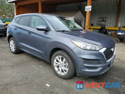 Czwarte zdjęcie samochodu z boku: 2019 HYUNDAI TUCSON SE VIN:KM8J23A40KU066816 - miniatura