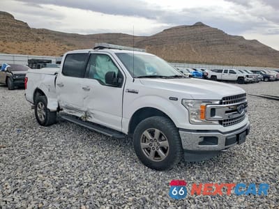 Czwarte zdjęcie samochodu z boku: 2018 FORD F150 XLT VIN:1FTEW1EG9JKC70625 - miniatura
