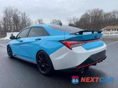 Trzecie zdjęcie samochodu z tyłu: 2023 HYUNDAI ELANTRA N BASE VIN:KMHLW4AK5PU010377 - miniatura