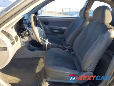 Zdjęcie 7 z 12 samochodu: 2003 HYUNDAI ACCENT BASE VIN:KMHCF35C63U271055 - miniatura