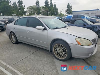 Czwarte zdjęcie samochodu z boku: 2004 NISSAN ALTIMA 2.5 VIN:1N4AL11D34C185884 - miniatura