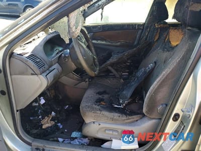 Zdjęcie 7 z 12 samochodu: 2003 TOYOTA CAMRY LE VIN:JTDBE32K130233125 - miniatura