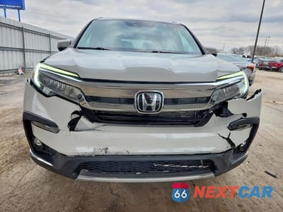 Piąte zdjęcie samochodu w środku: 2020 HONDA PILOT TOURING VIN:5FNYF6H69LB022579 - miniatura