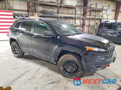 Czwarte zdjęcie samochodu z boku: 2017 JEEP CHEROKEE TRAILHAWK VIN:1C4PJMBS1HD226666 - miniatura