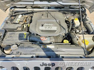 Zdjęcie 12 z 14 samochodu: 2012 JEEP WRANGLER SPORT VIN:1C4AJWAGXCL245391 - miniatura