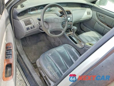 Zdjęcie 8 z 11 samochodu: 2000 TOYOTA AVALON XLS VIN:4T1BF28B8YU112151 - miniatura