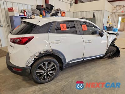 Trzecie zdjęcie samochodu z tyłu: 2016 MAZDA CX-3 GRAND TOURING VIN:JM1DKBD70G0113956 - miniatura