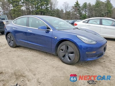 Czwarte zdjęcie samochodu z boku: 2019 TESLA MODEL 3 VIN:5YJ3E1EA2KF299372 - miniatura