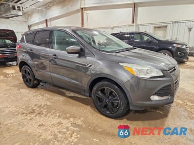 Czwarte zdjęcie samochodu z boku: 2015 FORD ESCAPE SE VIN:1FMCU9GX6FUB20679 - miniatura